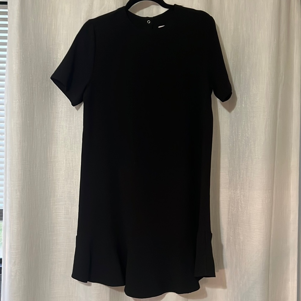 Black dress, ruffle bottom
